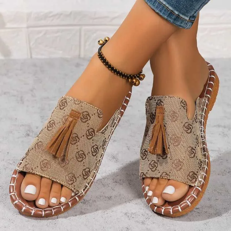 Playa para mujeres zapatillas de vacaciones informales 2024 Summer NUEVA Fashion Fringe zapatos planos al aire libre Sandalias d